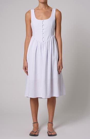 This lightweight, linen-kissed midi is designed in a sleeveless silhouette with a flared skirt. Side zip closure Front button closure Scoop neck Sleeveless Unlined 55% viscose, 45% linen Machine wash, line dry Imported Unlined A-line Midi Dress For Summer, Chic Sleeveless A-line Linen Dress, Sleeveless Fit And Flare Midi Dress For Garden Party, Sleeveless Fit And Flare Midi Dress For Daywear, Fit And Flare Sleeveless Midi Dress For Daywear, Spring Midi Dress Unlined Knee-length, Spring Knee-length Unlined Midi Dress, Fitted A-line Linen Summer Dress, Fitted Linen Sleeveless Dress For Daywear