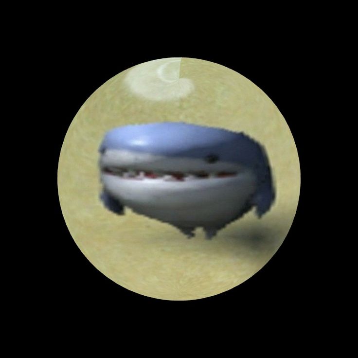 an image of a cartoon character in the shape of a shark with its mouth open