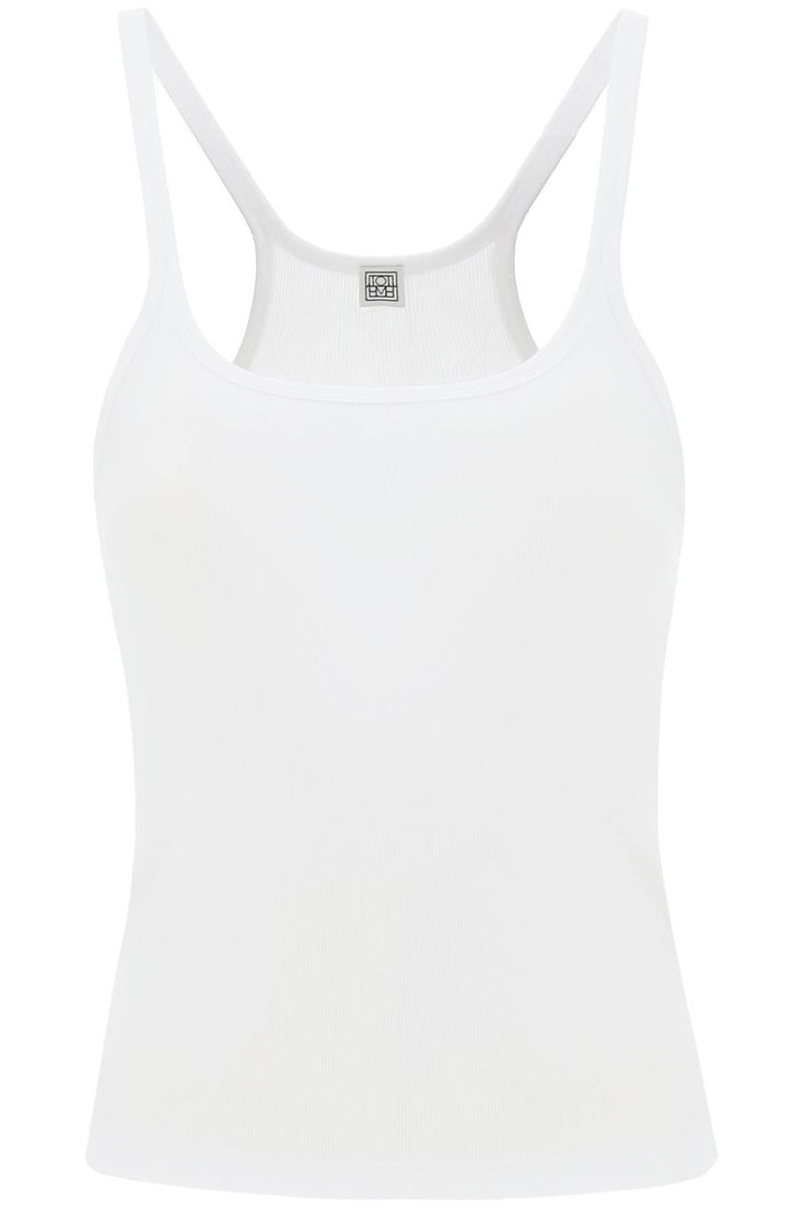 Made from stretch organic cotton rib, this Totême's fitted tank top is designed with a scoop neckline, a racer back and curved armholes. The model is 177 cm tall and wears a size XS. Size Info STANDARD Color Detail White Made In Portugal Material 95%CO 05%EA Season One spring Season Two summer Product clothing Brand Toteme Size And Fit Rib Tank Top, Fitted Tank Top, White Sleeveless Top, Scoop Neck Tank Top, Ribbed Tank Tops, Workout Tank Tops, White Tank Top, Racer Back, Scoop Neckline