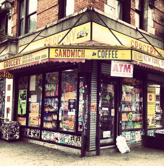 a store front on the corner of a city street