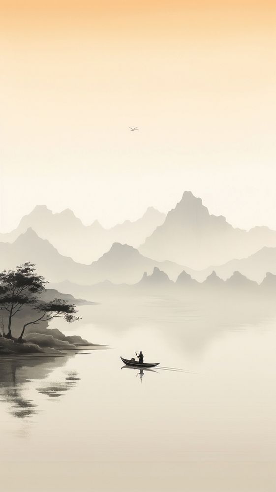 a person in a small boat on a body of water with mountains in the background