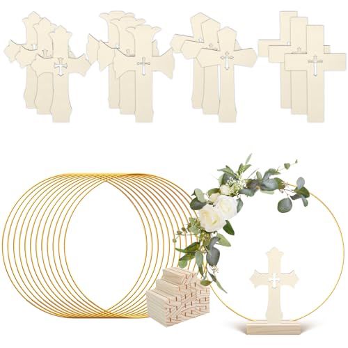 an assortment of crosses, flowers and candles are arranged in front of paper cutouts