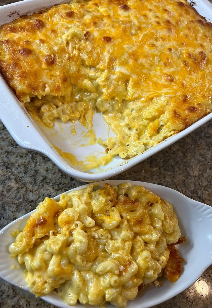 two white dishes filled with macaroni and cheese