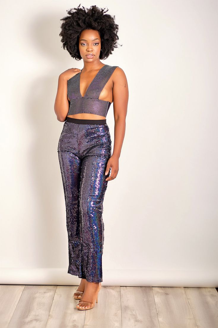 Shimmer shimmer. The fun pants you had no idea you needed. We're loving the all over sequins in a rich, navy blue color, wide leg fit and elasticized waistband. Don with your favorite blazer and bralette and heels and dance the night away at your favorite disco! CONTENT & CARE Hand wash with cold water Hang to dry Polyester DEETS & FIT Model is wearing a size Small Fabric has no stretch Model profile: Grace is 5'8.5" and measures 34 (bust) 27 (waist) and 42 (hips) Disco Style Sequin Bottoms For Party Season, Disco Sequin Bottoms For Party Season, Party Bottoms With Contrast Sequin And Stretch, Blue Sequined Bottoms For Party Season, Stretch Bottoms With Contrast Sequin For Night Out, Stretch Sequin Pants For Party, Shimmer Bottoms For Night Out In Summer, Disco Pants With Sequins For Night Out, Shimmer Bottoms For Summer Night Out