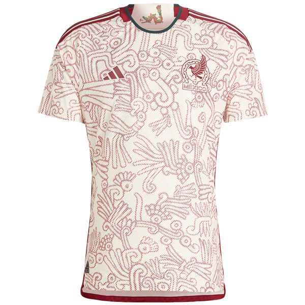 a red and white shirt with an intricate pattern on the chest, in front of a white background