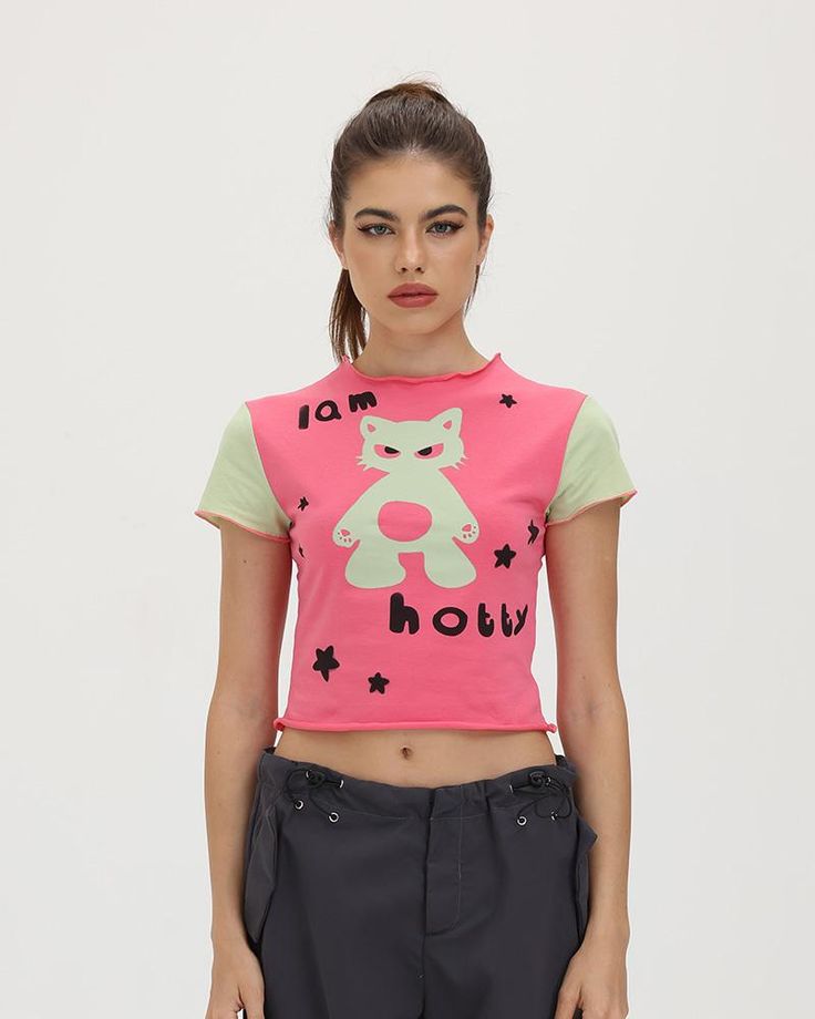 Model (WearingXS):• Height: 171cm | Bust: 83cm | Waist: 59cm | Hips: 89cmDetails: Pink T-shirt with "I am Hobby" meme graphic printTop Length: CroppedSleeve Length: Short SleevesMaterials:95% Cotton + 5% Spandex Y2k Crew Neck T-shirt With Character Print, Fitted Crew Neck T-shirt With Graphic Print, Fitted Streetwear T-shirt With Screen Print, Y2k Summer T-shirt With Graphic Design, Y2k Graphic Design T-shirt For Summer, Pink Y2k T-shirt With Letter Print, Fitted Graphic Print T-shirt With Crew Neck, Fitted Fun T-shirt With Screen Print, Y2k T-shirt With Character Print For Streetwear