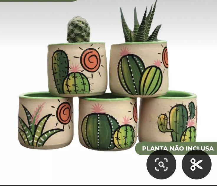 four planters with cactus designs painted on them