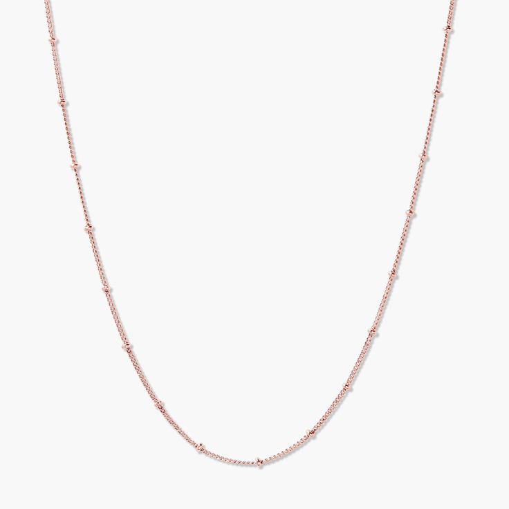 A simple, delicate beauty makes the Madeline Necklace an ideal addition of jewelry to your collection. Available in a 14k gold, silver, or rose gold finish, this beauty is as sleek as it is stylish. Perfect on its own or pair it with another necklace to create a new fabulous look. A timeless necklace that is a favorite with women of all ages. Available in 14k gold plated, rhodium plated or 14k rose gold plated brass 16" satellite chain with 2" extender Lobster claw closure Protected with an anti Feminine Rose Gold Necklace With Clavicle Chain, Feminine Rose Gold Necklaces With Clavicle Chain, Chic Rose Gold Chain Necklace With Delicate Chain, Elegant Rose Gold Cable Chain Necklaces, Chic Adjustable Rose Gold Chain Necklace, Elegant Rose Gold Necklace With Cable Chain, Delicate Rose Gold Cable Chain Necklace, Everyday Delicate Rose Gold Chain Necklace, Classic Rose Gold Clavicle Chain Necklace