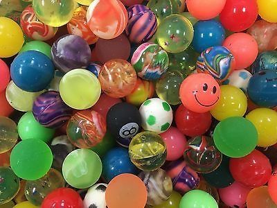 many different colored balls are piled on top of each other