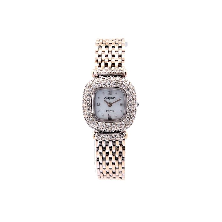 This one of a kind Avignon Mother of Pearl Diamond Watch features an elegant design in 14 karat white gold. A pave of seventy (70) .015 carat round brilliant cut diamonds decorate the watch's bezel. Vintage roman numerals, a mother of pearl face, and the designer Avignon wordmark adds a sleek vintage-inspired feel to this modern watch. Finished with a classic jubilee strap finished in shimmering 14 karat white gold. The watch measures 7 inches long. A fabulous gift for you or your loved one. Luxury White Gold Diamond Watch With Single Cut Diamonds, Timeless White Gold Diamond Watch For Everyday Luxury, Elegant Diamond Watch With Brilliant Cut And Round Dial, Elegant Round Diamond Watch With Brilliant Cut, Diamond Watch With Single Cut Diamonds As Gift, Elegant Brilliant Cut Diamond Watch, Diamond Watch With Diamond Accents As A Gift, Evening Diamond Watch With Brilliant Cut In Platinum, Brilliant Cut Diamond Watch In Platinum For Evening