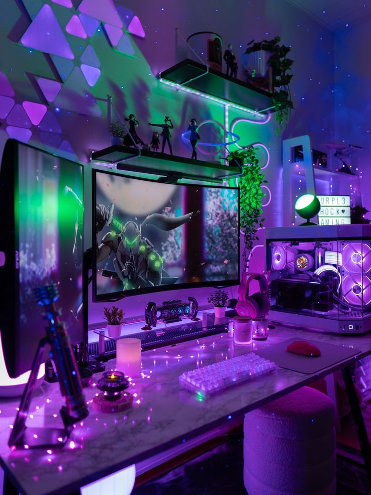 a computer desk with two monitors on top of it in front of purple and green lights