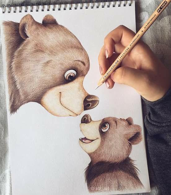 a drawing of two bears and a bear's head with a pencil in its mouth