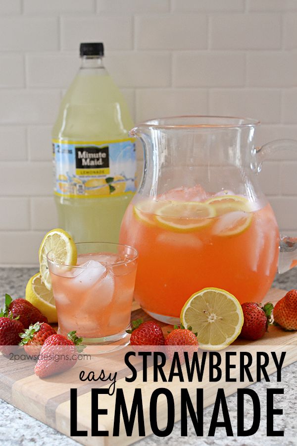 a pitcher of strawberry lemonade next to some sliced strawberries