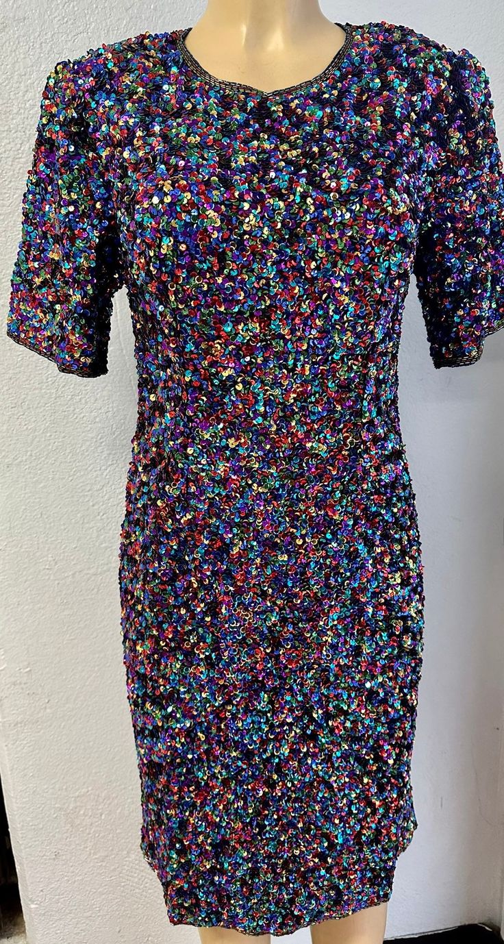 This sequin dress is handmade, high quality, original design and beautiful. This dress is suitable for party, events or any event. Multicolor Embellished Evening Dress, Elegant Multicolor Sequin Cocktail Dress, Embellished Multicolor Evening Dress, Glamorous Mini Sequin Dress For Festive Occasions, Glamorous Multicolor Cocktail Evening Dress, Festive Glitter Dresses For Party Season, Disco Style Embellished Mini Dress For Spring, Spring Party Sequin Dress With Contrast Sequin, Glamorous Mini Sequin Dress For Costume Party