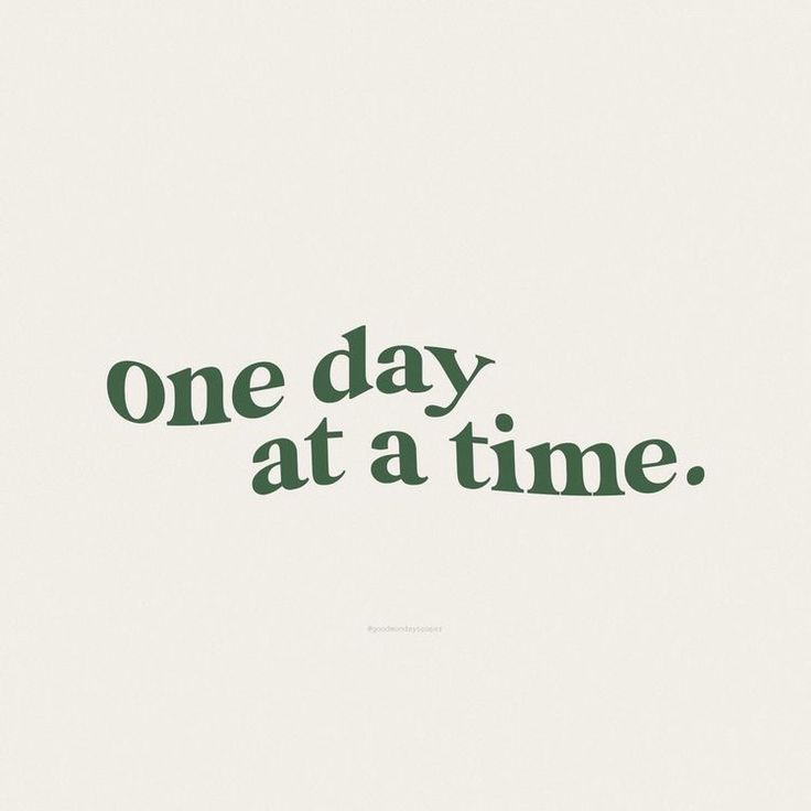 one day at a time is written in green ink on a white background with the words,