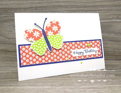 a close up of a card with a butterfly on it