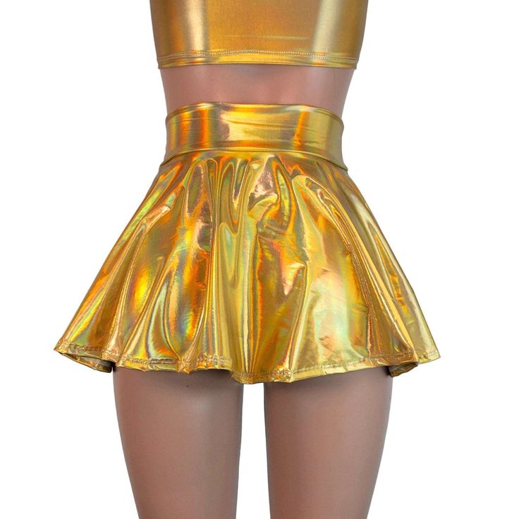 Stretch holographic gold opal spandex high-waisted skater skirt. The shimmery fabric shows a rainbow of colors in the light and swings and twirls with movement. The skirt length is 13" from top to bottom. Metallic Mini Skirt For Summer, Gold Stretch Shiny Bottoms, Shiny Fitted Party Shorts, Shiny Fitted Shorts For Party, Shiny Fitted Skirt For Party Season, Fitted Shiny Skirt For Party Season, Metallic Stretch Skirt For Summer, Summer Metallic Stretch Skirt, Shiny Stretch Mini Skirt