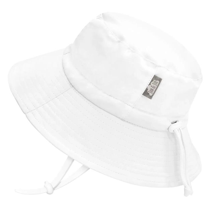 From sunny days to the unexpected rain shower, these hats are ready for anything! Jan & Jul's Aqua-Dry Bucket Hats provide rain-or-shine protection, while staying out of the face with reinforced stitching. Stay comfortable in and out of the water with lightweight quick-dry fabric, a breathable mesh liner and cotton sweatband. This Gro-With-Me® sun hat is guaranteed to fit your little one with an adjustable head drawstring and adjustable chinstrap. GRO-WITH-ME®: Fully adjustable head drawstring a White Adjustable Summer Sun Hat, Solid Waterproof Bucket Hat, Solid Wide Brim Waterproof Bucket Hat, Solid Hats With Uv Protection And Adjustable Fit, Summer Lightweight Waterproof Hats, Lightweight Waterproof Summer Hats, Waterproof Short Brim Sun Hat For Summer, White Wide Brim Bucket Hat With Adjustable Fit, Waterproof Bucket Hat With Curved Brim