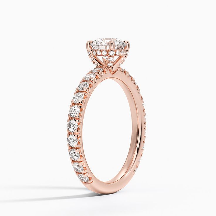 Olympia Diamond Engagement Ring - 14K Rose Gold. This classic engagement ring features sparkling diamond accents that extend three-fourths of the way around the ring. A diamond adorned gallery and graceful claw prongs embrace the center gem (5/8 total carat weight). Classic Engagement Ring, Classic Engagement, Lab Diamond Engagement Ring, Rose Gold Diamond Ring, Claw Prong, Sparkling Diamond, Classic Engagement Rings, Brilliant Earth, Sparkle Diamonds