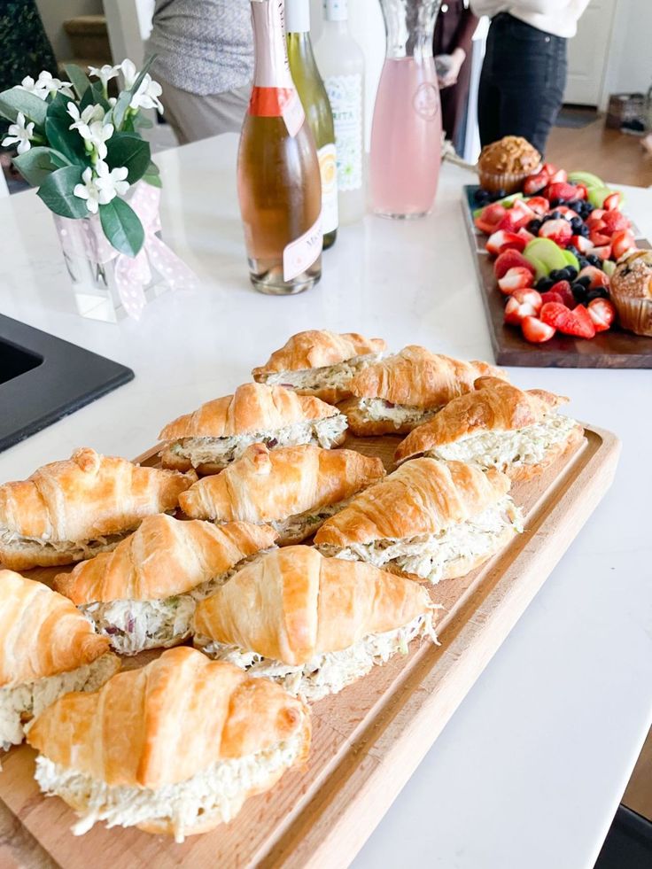 there are many croissants on the cutting board