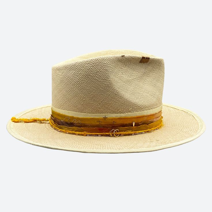 Silk and cotton ribbons with small details around crown Sweatband with 'That Summer Feeling' inspirational quote All hats are unique and have perfect imperfections! Straw hat hand woven in Ecuador Hand made and designed by Valeria in California Gold Fedora With Curved Brim For Beach, Gold Curved Brim Fedora For Beach, Luxury Wide Brim Fedora For The Beach, Luxury Wide Brim Fedora For Beach, Gold Wide Brim Bohemian Fedora, Luxury Fedora Straw Hat For Kentucky Derby, Luxury Fedora Straw Hat For Summer, Luxury Straw Hat With Curved Brim, Luxury Fedora Straw Hat For The Beach