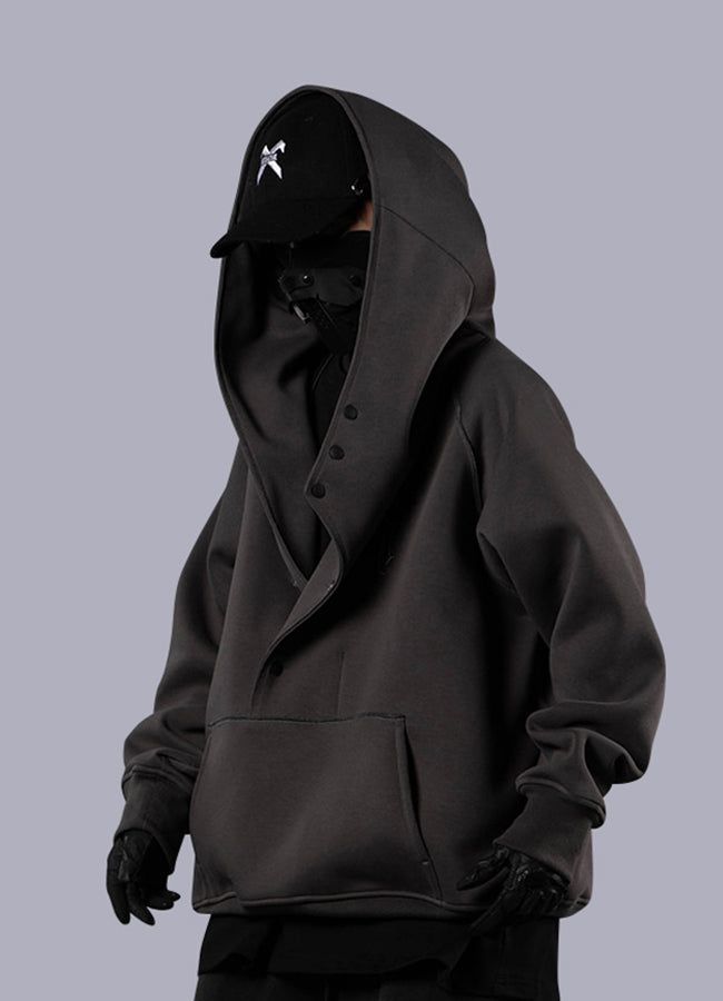 Push fashion boundaries with this cool and innovative Japanese hoodie. Immerse yourself in the world of avant-garde urban style with our Oversize Japanese Hoodie, a garment that fuses Asian streetwear aesthetics with the functionality of techwear. This uniquely designed hoodie caters to men and women who dare to challenge fashion norms while seeking comfort and warmth in their attire. Embrace this techwear hoodie's exceptional comfort with its spacious kangaroo pocket - a perfect sanctuary for y