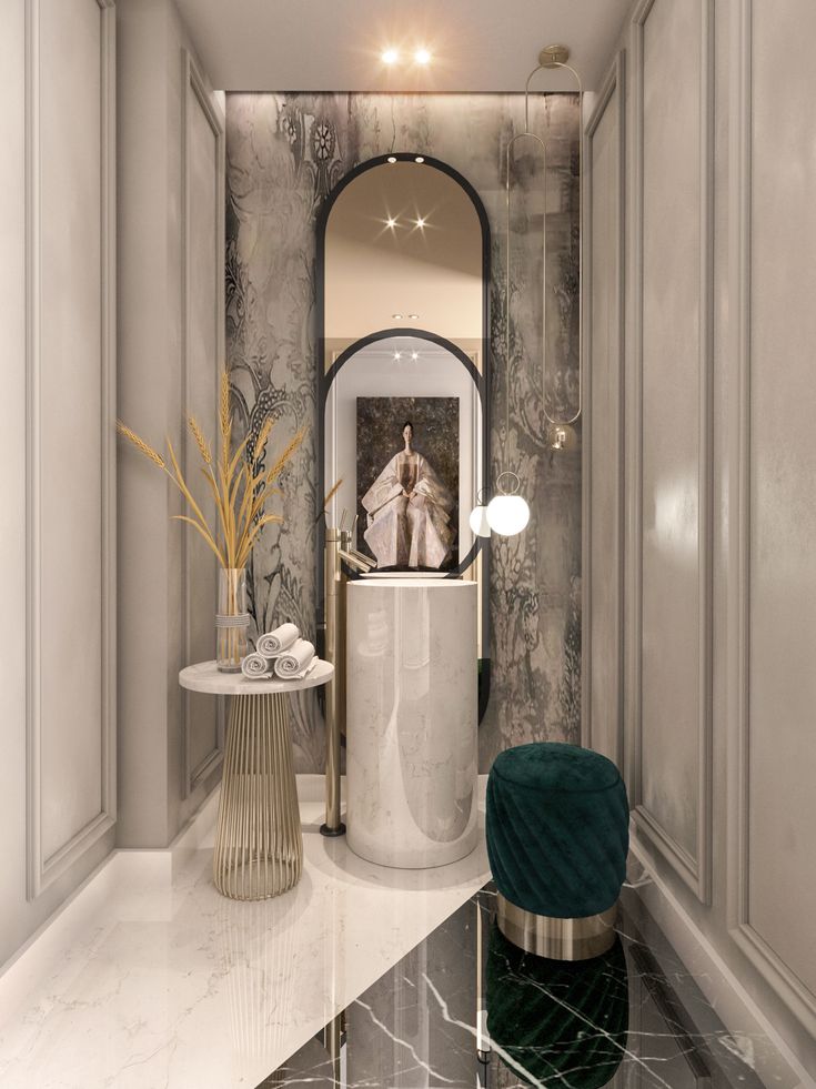 an elegant bathroom with marble floors and walls