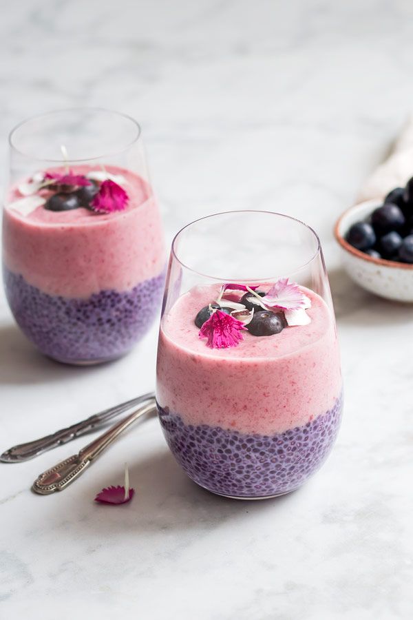 two glasses filled with blueberry chia pudding