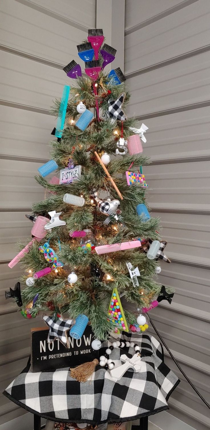 a small christmas tree with decorations on it