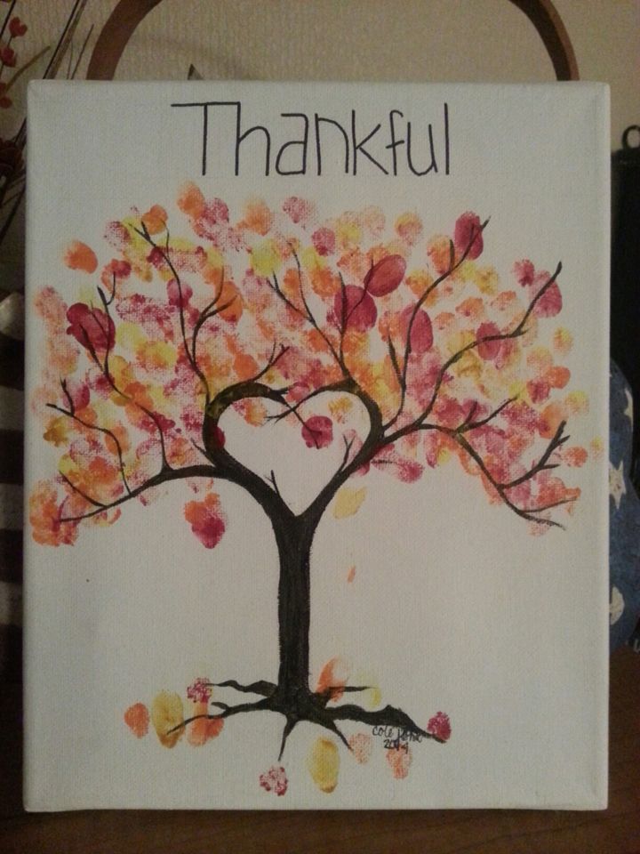 a painting with the words thank written on it and a tree painted in autumn colors