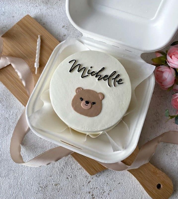 there is a cake with a bear on it