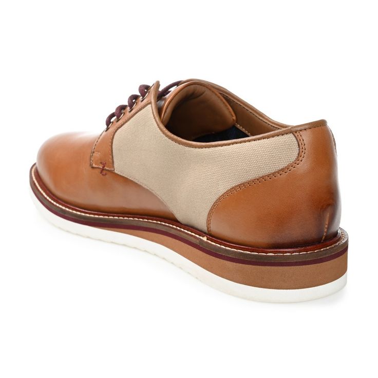 A dress shoe built for comfort the Stokes by Thomas and Vine. This dapper derby features genuine leather uppers detailed with a classic lace-up closure and textile accents at the sides. This style feels as good as it looks with a cushioned tongue an 8 mm Tru Comfort Foam� insole and an XL Extralight� outsole. Masculine Brown Lace-up Oxfords, Brown Low-top Lace-up Shoes For Business Casual, Brown Cap Toe Lace-up Shoes For Derby, Brown Plain Toe Lace-up Shoes For Business Casual, Oxford Shoes With Rubber Sole And Plain Toe, Leather Oxford Shoes With Rubber Sole For Derby, Oxford Lace-up Shoes With Moc Toe For Business Casual, Brown Lace-up Shoes With Contrast Sole For Derby, Brown Lace-up Oxfords For Business Casual