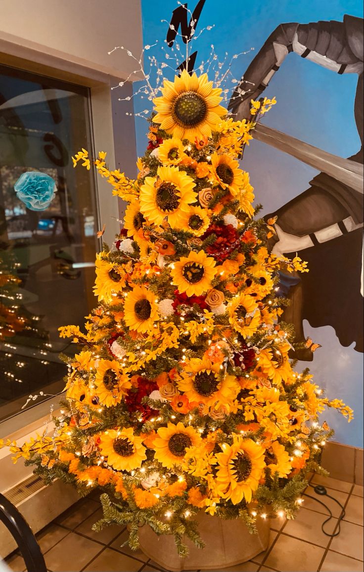 a sunflower christmas tree with lights and decorations