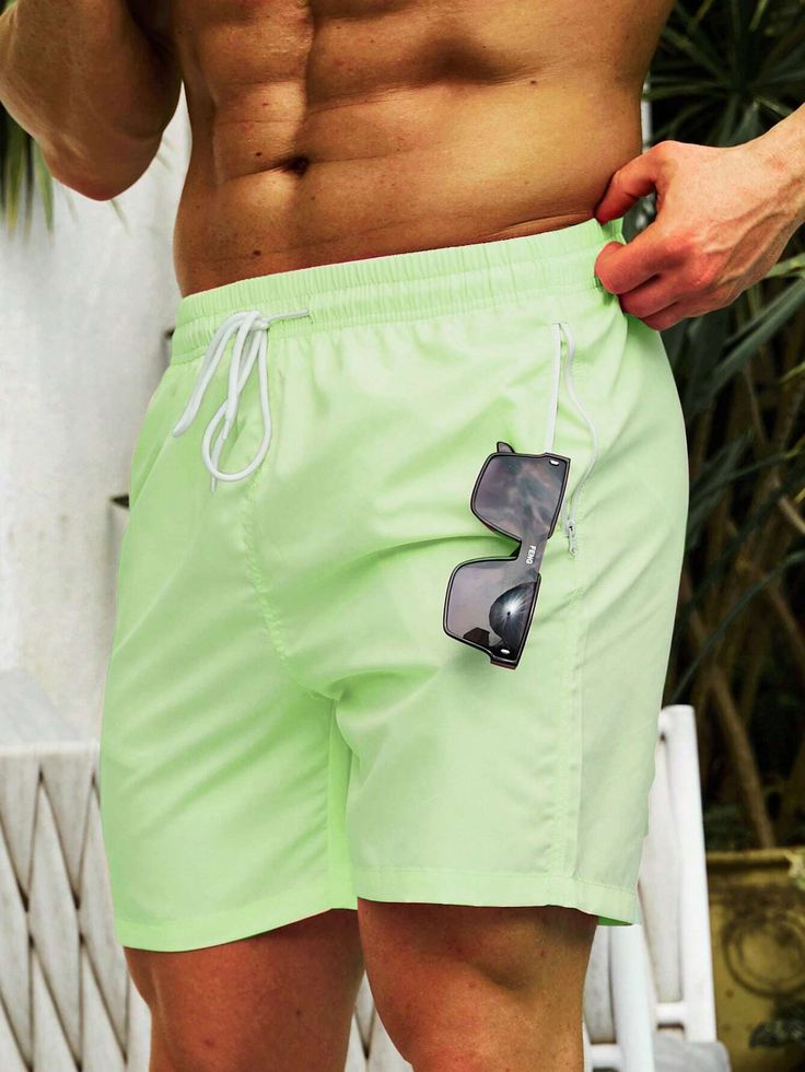 Get ready for beach adventures in our Zip Pocket Swim Trunks! The plain pattern adds a touch of sophistication, while the drawstring, pocket, and zipper details offer practicality. Crafted from non-stretch fabric, these shorts are designed to keep you stylish and comfortable all day long. Features: Pattern Type: Plain Details: Drawstring, Pocket, Zipper Type: Bottoms Bottom Type: Shorts Fabric: Non-Stretch Care Instructions: Machine wash, do not dry clean Body: Lined Size Chart ( Inches ): Size Vacation Shorts With Pockets For Beach Season, Vacation Beach Season Shorts With Pockets, Green Summer Swim Trunks With Elastic Waistband, Green Swim Trunks With Elastic Waistband For Summer, Green Swim Trunks With Elastic Waistband For Vacation, Casual Green Swim Trunks With Built-in Shorts, Drawstring Bermuda Shorts For Beach, Bermuda Drawstring Shorts For Beach, Outdoor Bottoms With Pockets For Beach Season