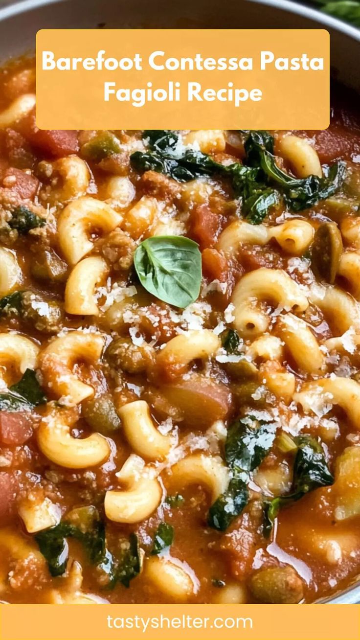 a white bowl filled with pasta and spinach