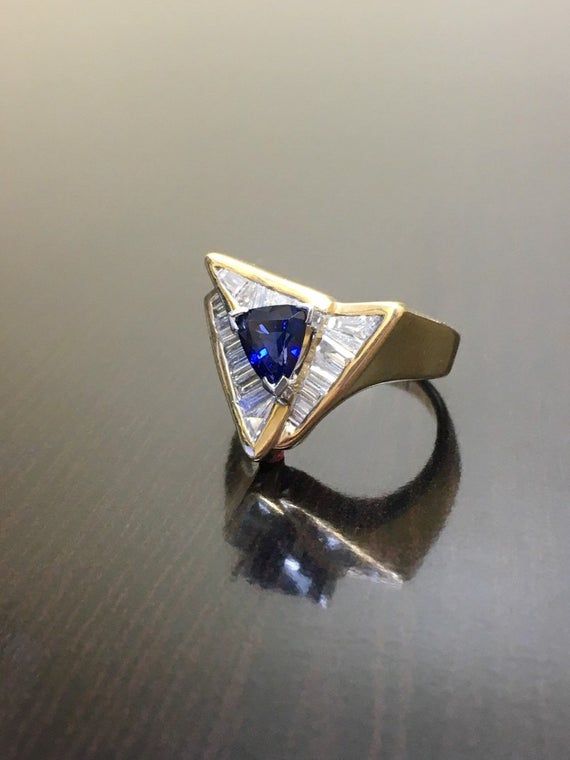 Art Deco 14K Yellow Gold Trillion Sapphire Diamond Engagement | Etsy Luxury Blue Marquise Cut Jewelry, Formal Tanzanite Trillion Cut Ring, Fine Jewelry Yellow Gold Trillion Cut Sapphire Ring, Trillion Cut Tanzanite Rings For Wedding, Trillion Cut Yellow Gold Sapphire Ring, Trillion Cut Sapphire Ring In 14k Yellow Gold, Blue Sapphire Ring With Trillion Cut Diamond, Trillion Cut Blue Sapphire Ring With Diamond, 14k Gold Trillion Cut Sapphire Ring