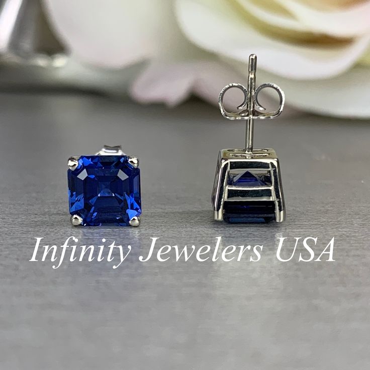 These earrings are asscher cut lab created blue sapphire studs, 14k white gold #6356 -Approximate total carat weight: 3.50ctw diamond equivalent -Center Stone Size: approx. 1.75ct each diamond equivalent -Gem Type: lab created blue sapphire -Stone Shape: asscher cut 7x7mm -Stone Clarity: VS2 -Stone Color: Brilliant Blue, Eye-Clean -Mohs Scale: 9 hardness -Metal Type and Purity: 14k white gold -Setting: 4 prong basket setting -Backing: friction back (earring backs are subject to change due to ava White Gold Sapphire Jewelry With Asscher Cut, Asscher Cut 14k White Gold Jewelry Gift, Luxury White Gold Jewelry With Asscher Cut Sapphire, Classic Sapphire Earrings For Anniversary, Modern Sapphire Jewelry With Gia Certification, Rectangular Blue Earrings For Anniversary, White Gold Asscher Cut Sapphire Jewelry, Modern Sapphire Jewelry Gia Certified, Formal Sapphire Jewelry With Asscher Cut