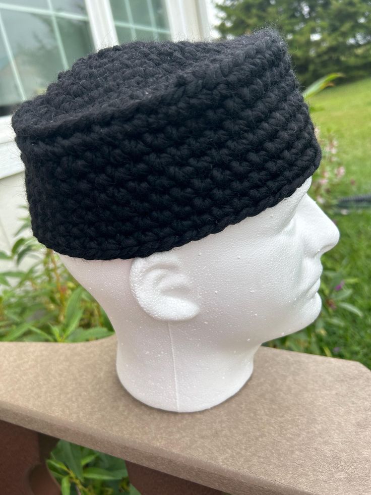 Crocheted with super bulky black recycled acrylic and recycled wool, these men's hats were inspired by those worn in The Chosen. Although those looked to be woven, these fit in a similar fashion. The styrofoam head shown is approximately 21 1/2" circumference at the forehead.  Hand wash, reshape and allow to air dry. Black Hats For Outdoor, Black Knitted Hat One Size Fits Most, Black One Size Fits Most Beanie Cap, Black Cap For Winter Costume, Casual Black Costume Hat One Size, Black Beanie Costume Hat For Winter, Black Wool Hat One Size Fits Most, Casual Black Crochet Hat For Outdoor, Black Flat Cap For Winter