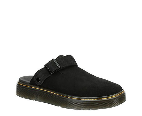 Dr. Martens Carlson Women s Clog Built for year-round wear, you should grab the Dr. Martens Carlson women s Clog before summer comes back around. Featuring a suede upper with rounded cutouts for easy entry, this Slip-On has an adjustable heel strap to customize the fit. The lining soothes your foot while the Flat sole keeps you grounded in style. Suede upper Slip-On w/ heel strapDual cutoutsTextile liningSynthetic sole Black Suede Clogs With Suede Lining, Casual Black Suede Clogs, Black Slip-on Clogs With Suede Lining, Casual Suede Mules With Buckle Closure, Casual Spring Clogs With Suede Lining, Dr Martens Carlson, Dr Martens Womens, Black Dr Martens, Rack Room