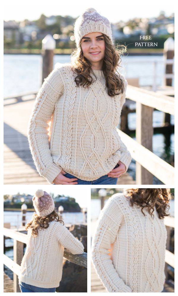 a woman wearing a hat and sweater standing on a dock with her hands in her pockets