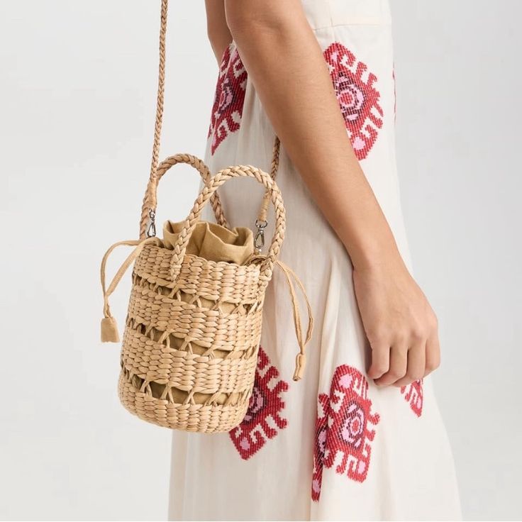 Hat Attack Mina Bag With Detachable Cross Body Strap. Used Once- Like New! Non Smoking Home. The Straw Bag Has A Canvas Liner With Drawstring Top. 4.75” Deep X 6” Tall (10” Total Height With Handles). Hardware On Strap Is Silver. Brown Woven Bucket Bag For Day Out, Casual Handheld Woven Bucket Bag, Casual Natural Bucket Bag With Mobile Phone Pocket, Casual Natural Bucket Bag With Phone Pocket, Chic Natural Straw Bag With Mobile Phone Pocket, Travel Straw Bucket Bag With Phone Holder, Travel Bucket Straw Bag With Phone Pocket, Travel Bucket Straw Bag With Phone Holder, Travel Bucket Straw Bag With Mobile Phone Holder