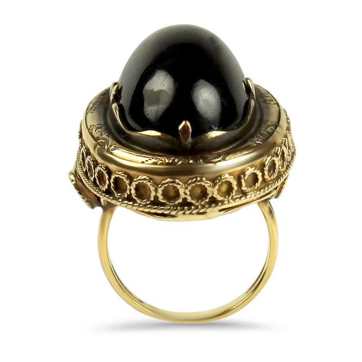 This 14K Yellow Gold Victorian Hair & Garnet Cabochon Ring is a stunning example of Victorian mourning jewelry. It features a 23x14mm garnet cabochon, weighing an estimated 36 carats, elegantly bezel set in an engraved and milgrained ring mounting. The closed back of the ring reveals framed woven hair, a traditional element of mourning pieces from the Victorian era. The ornate frame measures 31x22mm, complemented by a polished 2mm shank. This ring is size 6.5 and tested to be 14k gold. Please no Luxury Domed Cabochons For Formal Occasions, Luxury Cabochon Signet Ring For Formal Occasions, Formal 14k Gold Oval Cabochon Dome Ring, Oval Yellow Gold Cabochons For Formal Events, Formal Yellow Gold Cabochons With Bezel Setting, Elegant Domed Gemstone Signet Ring, Gold Dome Ring With Cabochon For Formal Events, Luxury Domed Cabochon Rings, Heirloom Style Domed Ring For Formal Occasions