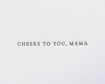 the words cheers to you, mama written in black ink on a white paper background