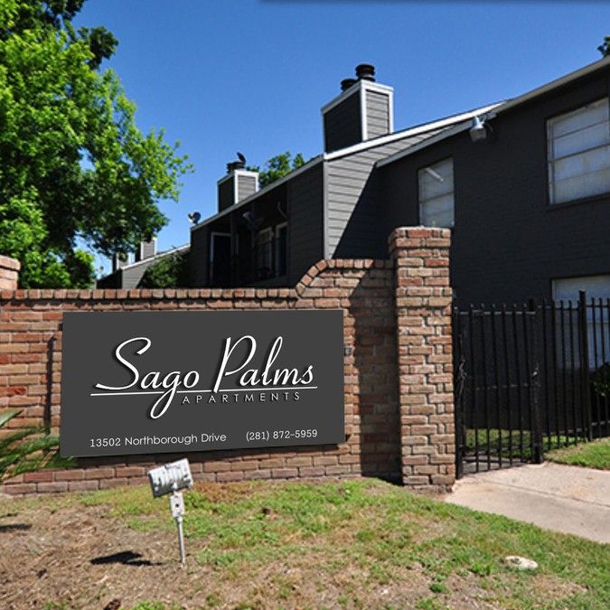 the sign for sago palms apartments in front of a brick fence and gated yard