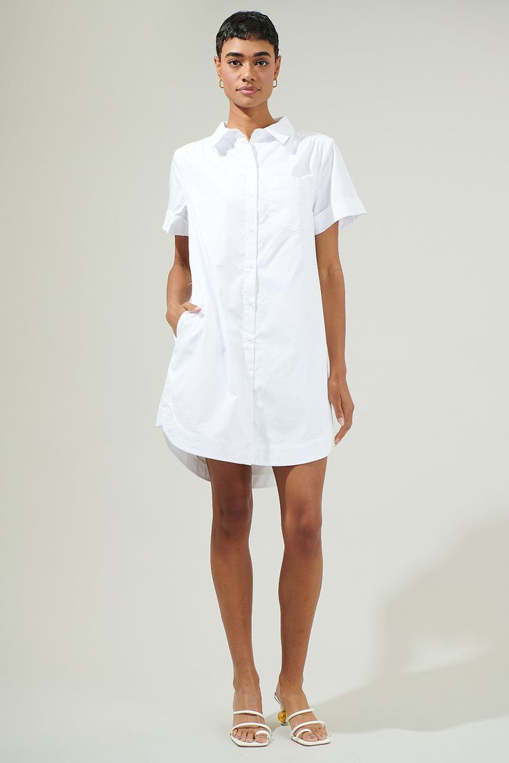 The Kaylee Button Down Shirt will instantly become a wardrobe staple! Fresh cotton fabric shapes this breezy dress that has a collared neckline and dolman short sleeves. The shift silhouette has a functional button placket down the center and ends at a mini hem. It can be easily be paired up with some with sneakers or high knee boots. - Short sleeves- Shirt dress- Button front- Pocket- Comes in 2 colorsSize + Fit - Model is 5'8" and wearing size XS- Measurements taken from size S - Chest: 20 1/2 Short Sleeve Shirt Dress For Day Out, Day Out Shirt Dress With Collared Neckline, Collared Shirt Dress With Placket For Day Out, Day Out Shirt Dress With Placket And Collared Neckline, Cotton Shirt Dress With Rolled Sleeves For Daywear, Classic Shirt Dress With Rolled Sleeves For Daywear, Shirttail Hem Shirt Dress For Daywear, Short Sleeve Shirt Dress With Buttons For Work, Shirt Dress With Placket And Shirttail Hem For Daywear