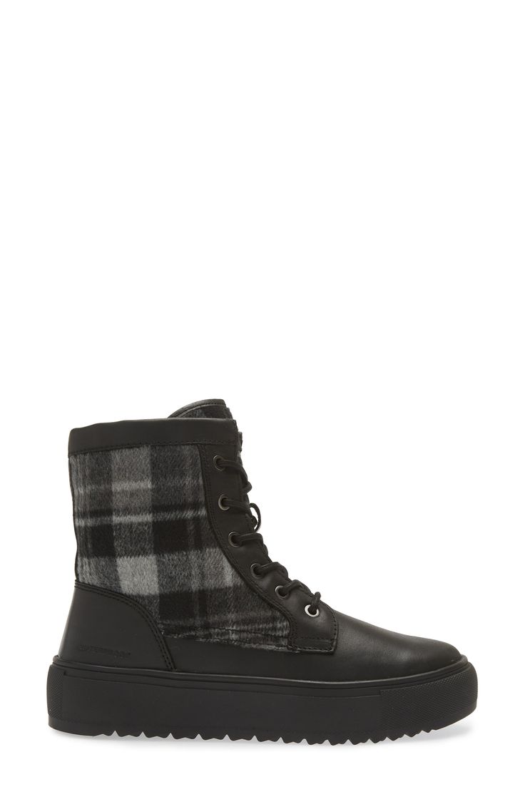 Ground your look in the utilitarian attitude of a lace-up combat boot set on a sturdy sawtoothed sole. Waterproof: protects against rain, puddles and slush to keep feet dry in wet conditions 1" platform Lace-up style; side zip closure Leather and textile upper/synthetic lining/rubber sole Imported Rugged Insulated Lace-up Combat Boots, Rugged Black Lace-up Boots For Outdoor Work, Black Weatherproof Lace-up Boots For Outdoor, Weatherproof Lace-up Combat Boots For Outdoor Work, Insulated Lace-up Combat Boots For Hiking, Lace-up Moto Boots For Outdoor Work In Fall, Fall Outdoor Work Lace-up Moto Boots, Fall Hiking Combat Boots With Reinforced Toe, Rugged Waterproof Combat Boots For Fall