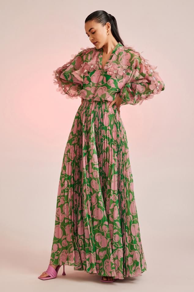 Green, pink pleated maxi dress with fruit motifs, puff sleeves and floral applique embellished.
Component: 1
Pattern: Embellished
Type Of Work: Floral
Neckline: Mandarin
Sleeve Type: Puff Sleeves
Fabric: Chiffon, Organza
Color: Green,Pink
Other Details: 
Applique work
Puff sleeves
Occasion: Party - Aza Fashions Pleated Silk Dress, Chiffon Dress Ideas, Casual Gowns Maxi Dresses, Resort Concept, Pankaj And Nidhi, Colorful Gown, Maxi Dress For Women, Maxi Dress Outfit, Printed Gowns