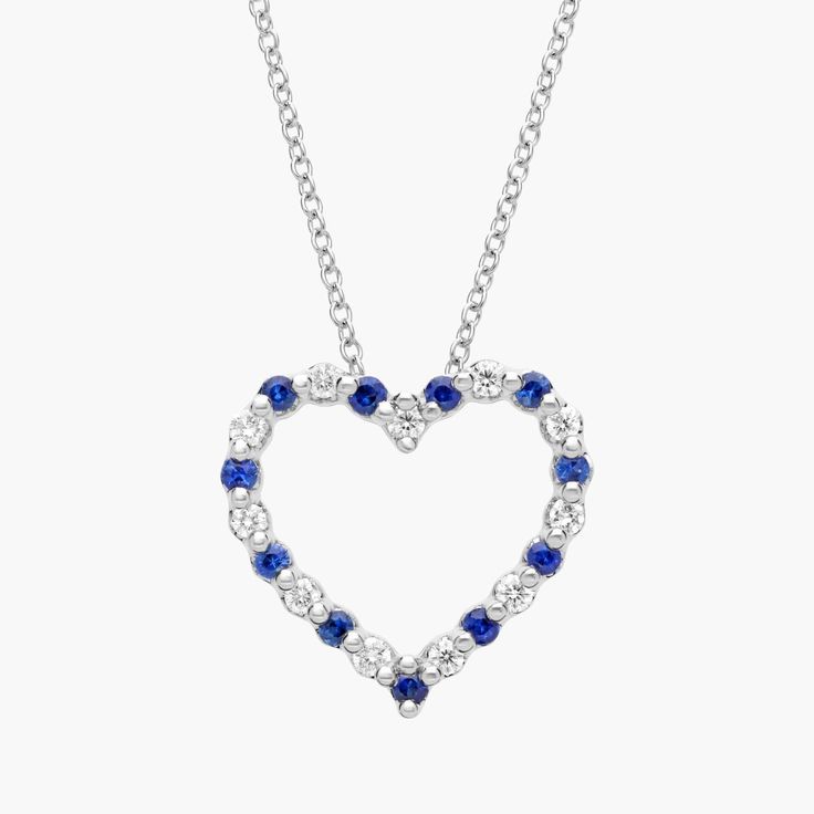 Add a touch of love to your style with this elegant floating pendant featuring a romantic heart shape. The 14k white gold design is set with gorgeously blue sapphires, alternating with brilliantly shimmering diamonds. Sapphire Heart Pendant Jewelry For Anniversary, Fine Jewelry Sapphire Heart Pendant, Heart Cut Sapphire Jewelry For Valentine's Day, Heart-shaped Sapphire Necklace For Formal Occasions, Heart-shaped Sapphire Necklace For Formal, Sapphire Heart Cut Jewelry With Brilliant Cut, Valentine's Day Heart Cut Sapphire Jewelry, Anniversary Sapphire Heart Pendant Necklace, White Gold Sapphire Jewelry For Valentine's Day