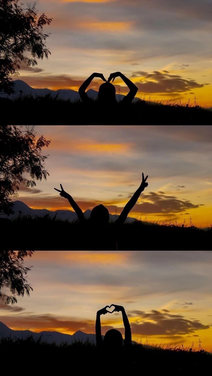 the silhouettes of two people doing yoga poses in front of an orange and yellow sunset