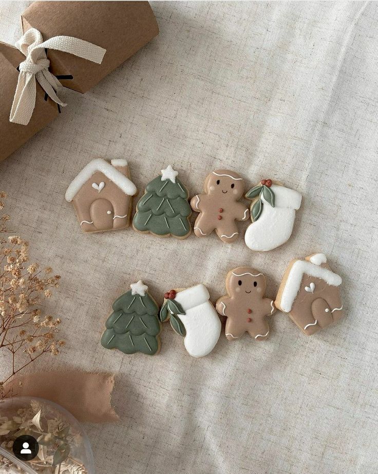 decorated cookies are arranged in the shape of animals